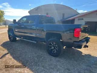 2018 Chevrolet Silverado 2500HD High Country с VIN 1GC1KXEY8JF125042, выставлен на аукционе Copart как лот 90888595 с пробегом 121 356 миль миль и Списание • Salvage title. История ставок и продаж доступна на DreamBid. Изображение 3.