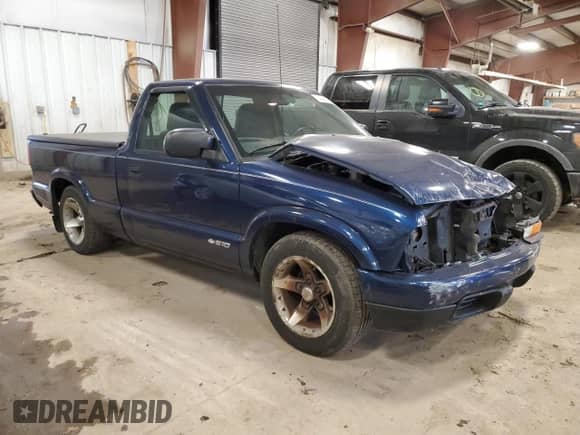 2003 Chevrolet S-10 with VIN 1GCCS14X238266579, listed as a Copart auction lot 41457055 with 115,201 mi miles and Clean title. Bid and sale history available at DreamBid. Image 4.