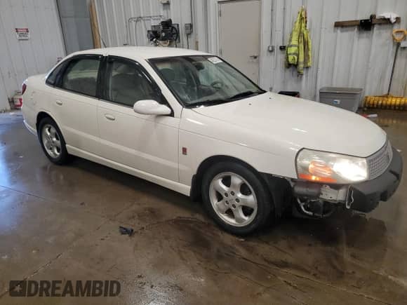 2004 Saturn L L300 2 with VIN 1G8JD54R94Y513778, listed as a Copart auction lot 48287505 with 102,017 mi miles and Non repairable. Bid and sale history available at DreamBid. Image 4.