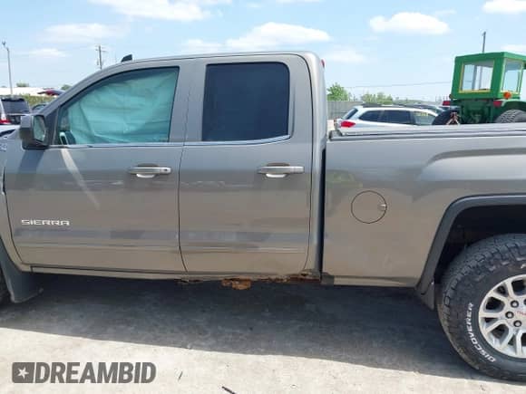 2017 GMC Sierra 1500 SLE with VIN 1GTV2MEC4HZ242534, listed as a IAAI auction lot 42534755 with 69,028 mi miles and . Bid and sale history available at DreamBid. Image 14.