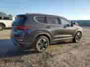 2020 Hyundai Santa Fe Limited z VIN 5NMS53AAXLH275723, wystawiony jako Copart lot #86650845 z przebiegiem 101 571 mil mil oraz Szkoda całkowita • Salvage title. Historia ofert i sprzedaży dostępna na DreamBid. Obrazek 3.