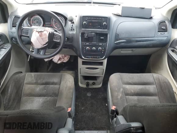 2015 Dodge Grand Caravan American Value with VIN 2C4RDGBG6FR565950, listed as a Copart auction lot 66317895 with 136,573 mi miles and Salvage title. Bid and sale history available at DreamBid. Image 8.