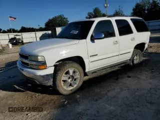 2002 Chevrolet Tahoe LT with VIN 1GNEC13Z12R298965, listed as a Copart auction lot 86448795 with 241,871 mi miles and Salvage title. Bid and sale history available at DreamBid. Image 1.