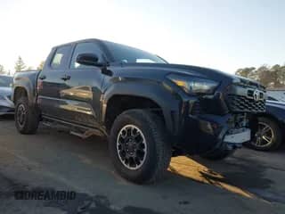2024 Toyota Tacoma SR5 with VIN 3TYLB5JN3RT032583, listed as a IAAI auction lot 41404527 with 7,130 mi miles and . Bid and sale history available at DreamBid. Image 1.