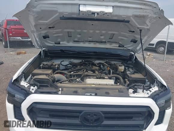 2025 Toyota Tacoma SR with VIN 3TMLB5JN0SM110089, listed as a IAAI auction lot 43218799 with 19,573 mi miles and . Bid and sale history available at DreamBid. Image 10.