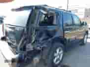 2014 Chevrolet Tahoe LS with VIN 1GNSCAE05ER129327, listed as a IAAI auction lot 42927037 with 149,789 mi miles and . Bid and sale history available at DreamBid. Image 6.