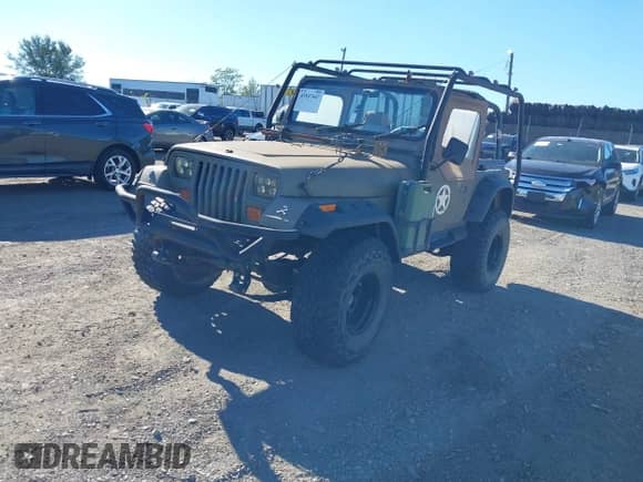 1992 Jeep Wrangler with VIN 2J4FY29S7NJ543564, listed as a IAAI auction lot 43547447 with Not provided miles and . Bid and sale history available at DreamBid. Image 2.