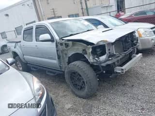 2012 Toyota Tacoma with VIN 3TMLU4ENXCM083340, listed as a IAAI auction lot 41704584 with 120,944 mi miles and . Bid and sale history available at DreamBid. Image 1.