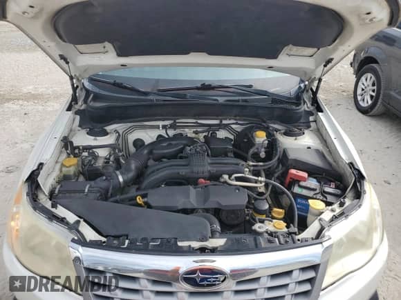 2013 Subaru Forester X Limited z VIN JF2SHAEC1DH442661, wystawiony jako Copart lot #82128475 z przebiegiem 220 891 mil mil oraz Szkoda całkowita • Salvage title. Historia ofert i sprzedaży dostępna na DreamBid. Obrazek 12.