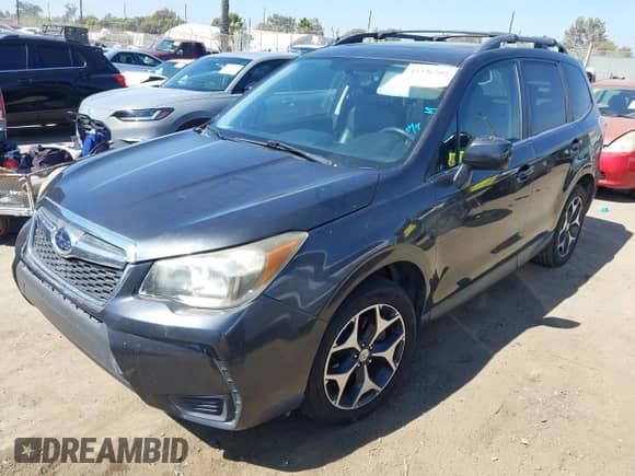 2014 Subaru Forester XT Premium with VIN JF2SJGDC0EH520728, listed as a IAAI auction lot 43336202 with 165,577 mi miles and . Bid and sale history available at DreamBid. Image 17.