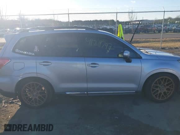 2016 Subaru Forester XT Touring z VIN JF2SJGXCXGH482715, wystawiony jako IAAI lot #41211792 z przebiegiem 95 610 mil mil oraz . Historia ofert i sprzedaży dostępna na DreamBid. Obrazek 13.