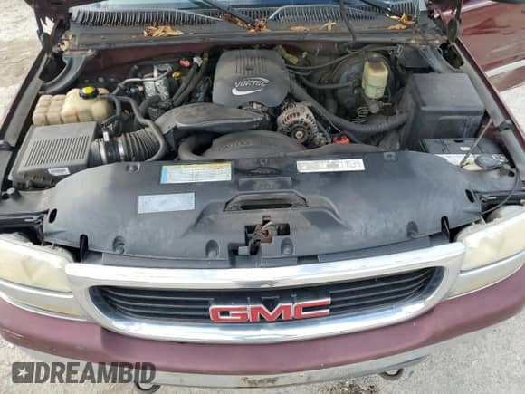 2001 GMC Sierra 1500 SLE z VIN 2GTEC19TX11273016, wystawiony jako Copart lot #71158645 z przebiegiem 306 098 mil mil oraz Szkoda całkowita • Salvage title. Historia ofert i sprzedaży dostępna na DreamBid. Obrazek 11.