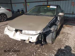 1997 Saturn 2dr Coupe с VIN 1G8ZH127XVZ333643, выставлен на аукционе IAAI как лот 42463504 с пробегом 104 295 миль миль и . История ставок и продаж доступна на DreamBid. Изображение 2.