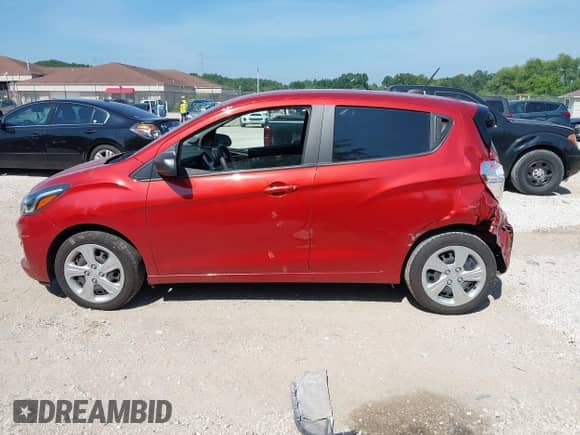 2022 Chevrolet Spark LS z VIN KL8CB6SAXNC026085, wystawiony jako IAAI lot #42725750 z przebiegiem 67 759 mil mil oraz . Historia ofert i sprzedaży dostępna na DreamBid. Obrazek 14.