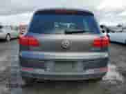 2013 Volkswagen Tiguan SE z VIN WVGAV3AX2DW607051, wystawiony jako Copart lot #44391625 z przebiegiem 61 220 mil mil oraz Szkoda całkowita • Salvage title. Historia ofert i sprzedaży dostępna na DreamBid. Obrazek 6.