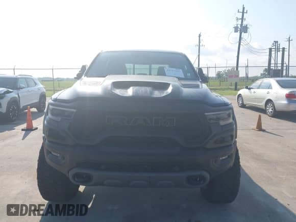 2022 Ram 1500 TRX with VIN 1C6SRFU9XNN249207, listed as a IAAI auction lot 42383861 with 27,211 mi miles and . Bid and sale history available at DreamBid. Image 6.