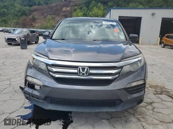 2016 Honda Pilot LX z VIN 5FNYF6H17GB114994, wystawiony jako Copart lot #69847335 z przebiegiem 112 765 mil mil oraz Szkoda całkowita • Salvage title. Historia ofert i sprzedaży dostępna na DreamBid. Obrazek 5.