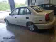 2002 Hyundai Accent GL z VIN KMHCG45C32U373009, wystawiony jako Copart lot #62753865 z przebiegiem Nie podano mil oraz Szkoda całkowita • Salvage title. Historia ofert i sprzedaży dostępna na DreamBid. Obrazek 2.