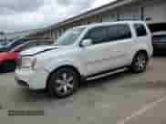 2014 Honda Pilot Touring with VIN 5FNYF3H92EB006641, listed as a Copart auction lot 69729915 with 162,386 mi miles and Salvage title. Bid and sale history available at DreamBid. Image 1.