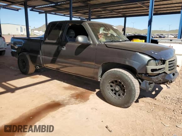 2003 GMC Sierra 1500 SLE z VIN 2GTEC19V831300489, wystawiony jako Copart lot #82320705 z przebiegiem 146 528 mil mil oraz Szkoda całkowita • Salvage title. Historia ofert i sprzedaży dostępna na DreamBid. Obrazek 4.