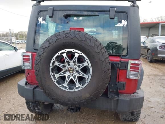 2013 Jeep Wrangler Sport with VIN 1C4AJWAG0DL589698, listed as a IAAI auction lot 41681909 with 80,241 mi miles and . Bid and sale history available at DreamBid. Image 17.
