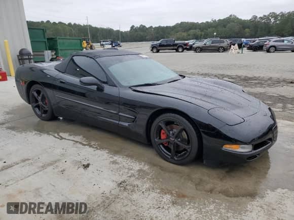 1999 Chevrolet Corvette with VIN 1G1YY32G9X5128122, listed as a Copart auction lot 86154285 with 42,866 mi miles and Salvage title. Bid and sale history available at DreamBid. Image 4.