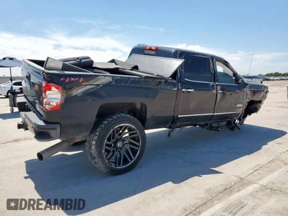 2018 Chevrolet Silverado 2500HD High Country с VIN 1GC1KXEY9JF101557, выставлен на аукционе Copart как лот 65374345 с пробегом Не указан миль и Списание • Salvage title. История ставок и продаж доступна на DreamBid. Изображение 3.