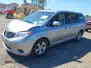 2012 Toyota Sienna with VIN 5TDKA3DC8CS014421, listed as a IAAI auction lot 42796292 with 227,527 mi miles and . Bid and sale history available at DreamBid. Image 2.