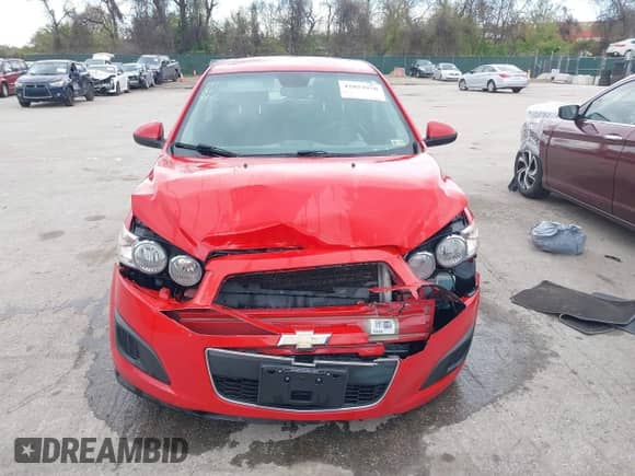 2012 Chevrolet Sonic LT with VIN 1G1JC6SB1C4226485, listed as a IAAI auction lot 42022970 with 105,582 mi miles and . Bid and sale history available at DreamBid. Image 13.