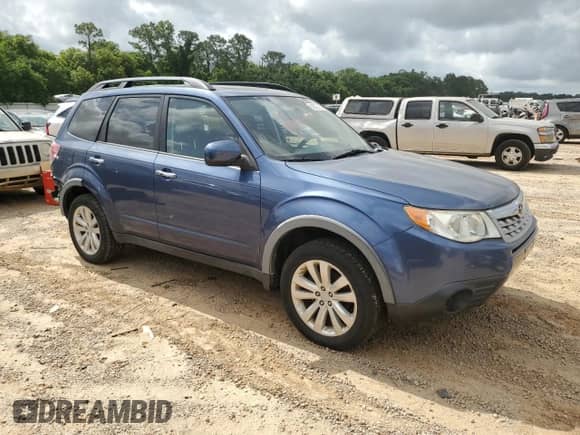 2011 Subaru Forester X Premium с VIN JF2SHADC9BG709453, выставлен на аукционе Copart как лот 56572155 с пробегом 145 359 миль миль и Списание • Salvage title. История ставок и продаж доступна на DreamBid. Изображение 4.