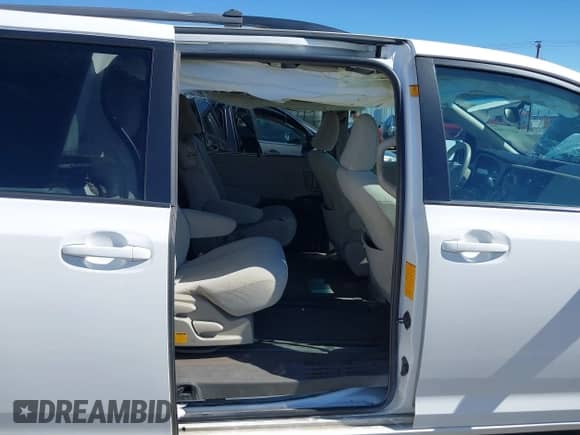 2011 Toyota Sienna LE with VIN 5TDKK3DC5BS156172, listed as a IAAI auction lot 43237005 with 159,013 mi miles and . Bid and sale history available at DreamBid. Image 8.