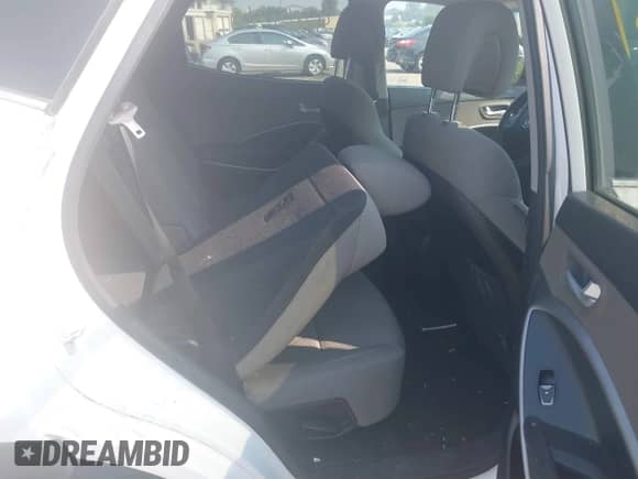 2016 Hyundai Santa Fe z VIN 5XYZTDLB9GG344210, wystawiony jako IAAI lot #42860369 z przebiegiem 119 201 mil mil oraz . Historia ofert i sprzedaży dostępna na DreamBid. Obrazek 8.