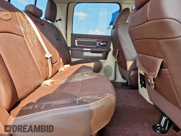 2014 Ram 1500 Longhorn z VIN 1C6RR7PM6ES431251, wystawiony jako Copart lot #80637725 z przebiegiem 69 587 mil mil oraz Szkoda całkowita • Salvage title. Historia ofert i sprzedaży dostępna na DreamBid. Obrazek 10.