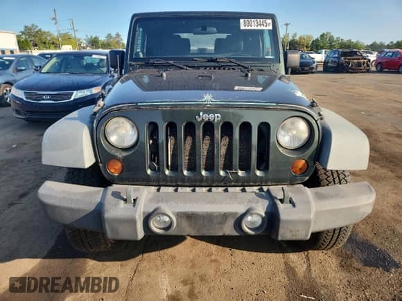 2012 Jeep Wrangler Sport with VIN 1C4AJWAGXCL110511, listed as a Copart auction lot 80013445 with 171,677 mi miles and Clean title. Bid and sale history available at DreamBid. Image 5.