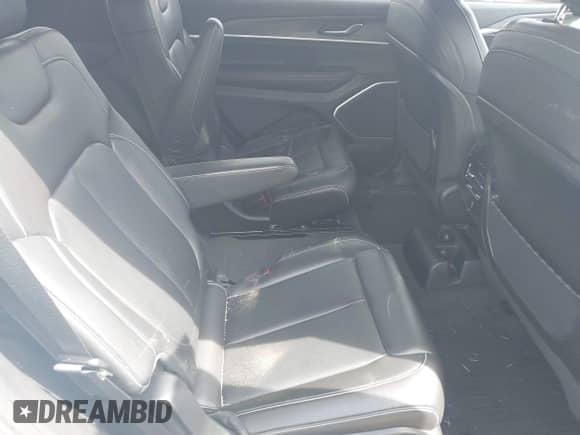 2022 Jeep Grand Cherokee Limited with VIN 1C4RJKBG7N8555451, listed as a IAAI auction lot 42670111 with 51,520 mi miles and . Bid and sale history available at DreamBid. Image 7.