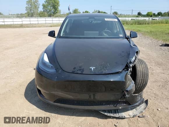 2024 Tesla Model Y Long Range z VIN 7SAYGAEE1RF185847, wystawiony jako Copart lot #67958465 z przebiegiem 17 892 mil mil oraz Szkoda całkowita • Salvage title. Historia ofert i sprzedaży dostępna na DreamBid. Obrazek 5.