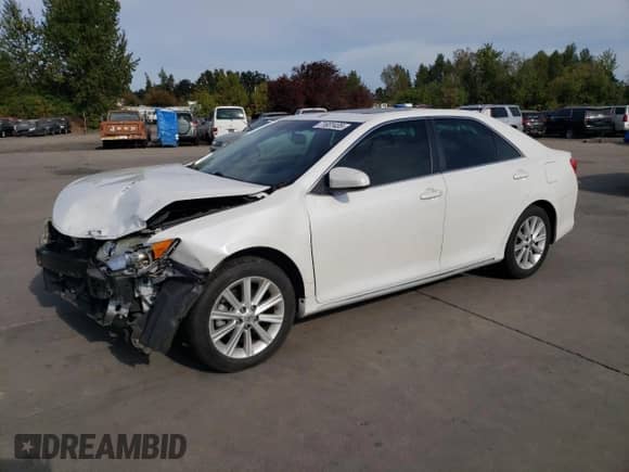 2014 Toyota Camry L with VIN 4T1BF1FK0EU449180, listed as a Copart auction lot 71831435 with 127,793 mi miles and Salvage title. Bid and sale history available at DreamBid. Image 1.