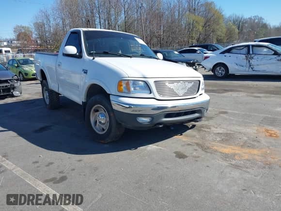 2000 Ford F-150 XL with VIN 1FTRF18W2YNB42014, listed as a IAAI auction lot 41827247 with Not provided miles and . Bid and sale history available at DreamBid. Image 1.