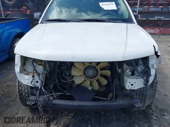 2018 Nissan Frontier SV z VIN 1N6AD0EV1JN717375, wystawiony jako IAAI lot #42491578 z przebiegiem 88 000 mil mil oraz . Historia ofert i sprzedaży dostępna na DreamBid. Obrazek 12.