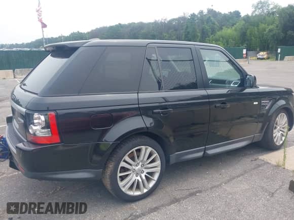 2013 Land Rover Range Rover Sport HSE Lux z VIN SALSK2D45DA770330, wystawiony jako IAAI lot #42925359 z przebiegiem 137 007 mil mil oraz . Historia ofert i sprzedaży dostępna na DreamBid. Obrazek 13.