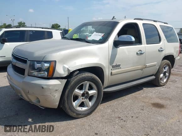 2007 Chevrolet Tahoe LT with VIN 1GNFC13067R104587, listed as a IAAI auction lot 43223507 with 217,966 mi miles and . Bid and sale history available at DreamBid. Image 17.