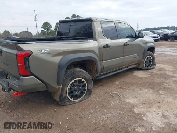 2024 Toyota Tacoma SR5 with VIN 3TMLB5JN2RM044896, listed as a IAAI auction lot 41575173 with 4,293 mi miles and . Bid and sale history available at DreamBid. Image 6.