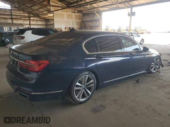 2016 BMW 7 Series 750i with VIN WBA7F0C5XGGL99115, listed as a Copart auction lot 65112705 with Not provided miles and Salvage title. Bid and sale history available at DreamBid. Image 3.
