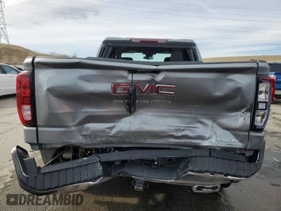 2023 GMC Sierra 1500 SLE with VIN 1GTUUBED4PZ167786, listed as a Copart auction lot 49710205 with 46,101 mi miles and Salvage title. Bid and sale history available at DreamBid. Image 6.