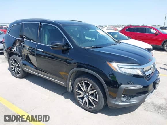 2021 Honda Pilot Elite with VIN 5FNYF6H02MB079610, listed as a IAAI auction lot 42309677 with 51,451 mi miles and . Bid and sale history available at DreamBid. Image 1.