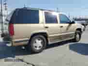1999 Chevrolet Tahoe Z71 with VIN 1GNEK13R0XJ361210, listed as a Copart auction lot 65560725 with 196,208 mi miles and Salvage title. Bid and sale history available at DreamBid. Image 3.