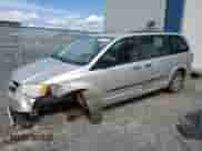 2012 Dodge Grand Caravan SE with VIN 2C4RDGBG7CR103750, listed as a Copart auction lot 71474485 with 217,319 mi miles and Salvage title. Bid and sale history available at DreamBid. Image 1.