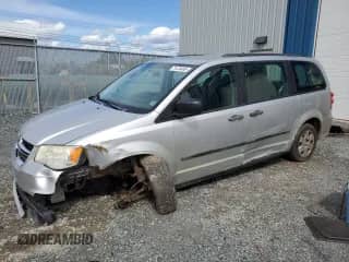 2012 Dodge Grand Caravan SE with VIN 2C4RDGBG7CR103750, listed as a Copart auction lot 71474485 with 217,319 mi miles and Salvage title. Bid and sale history available at DreamBid. Image 1.
