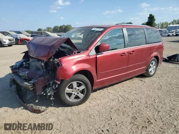 2011 Dodge Grand Caravan Crew with VIN 2D4RN5DG5BR646790, listed as a Copart auction lot 82227525 with Not provided miles and Clean title. Bid and sale history available at DreamBid. Image 1.