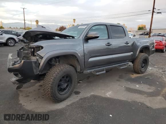 2021 Toyota Tacoma SR5 с VIN 3TMDZ5BN2MM108586, выставлен на аукционе Copart как лот 84925984 с пробегом 112 793 миль миль и Списание • Salvage title. История ставок и продаж доступна на DreamBid. Изображение 1.